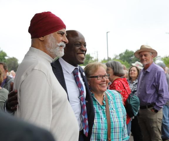 Mayor Yemi takes a picture with residents who attended the Senior Center groundbreaking.
